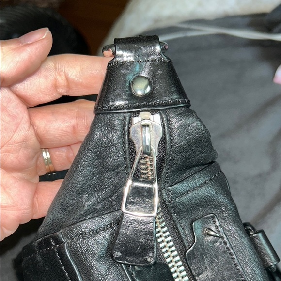 Olivia Harris Black Leather Duffel Bag with Modern Chain-Link Design - Picture 10 of 16